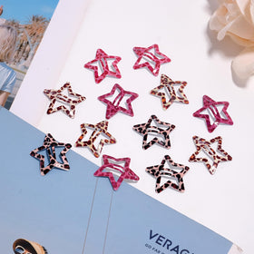 SAOROPEB Star Hair Clips in a lifestyle scene with accessories