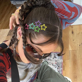 SAOROPEB Star Hair Clips with packaging on a surface