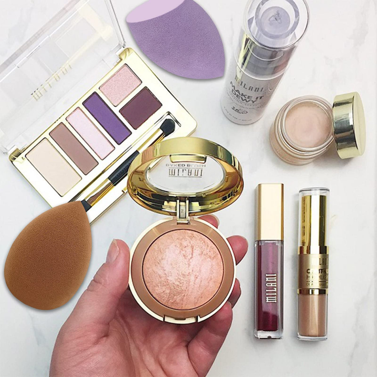 Scartink makeup sponge being used for foundation application