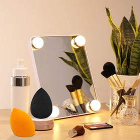 Scartink makeup sponge being used on a model's face