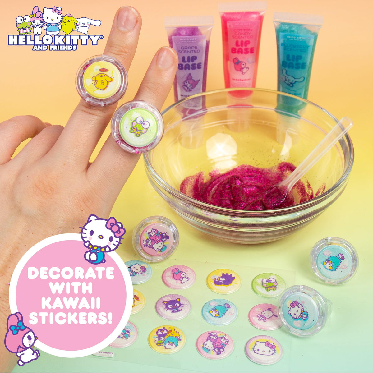 Scented lip gloss tubes in blueberry, cotton candy, and grape