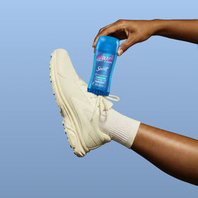 Secret Outlast Antiperspirant Deodorant held in hand