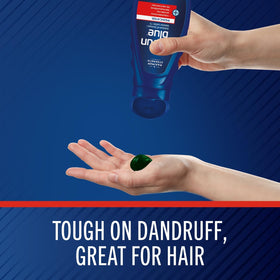Selsun Blue Medicated Anti-Dandruff Shampoo in a bathroom setting