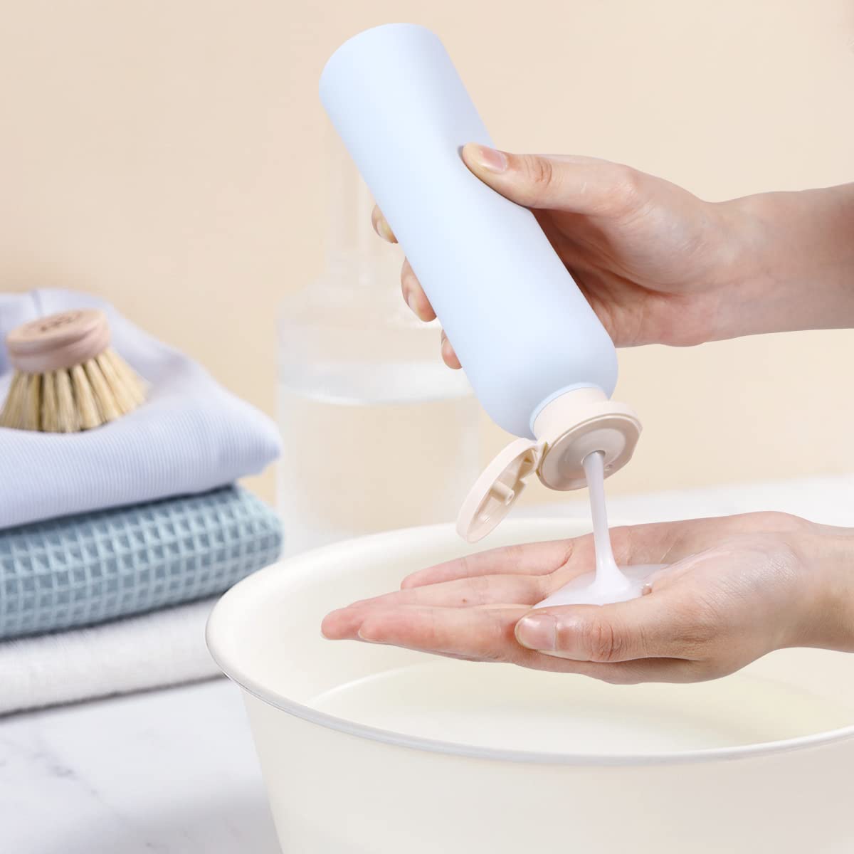 Set of UMETASS refillable travel shampoo bottles blue