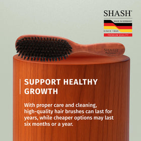 SHASH Classic Hair Brush on a wooden surface
