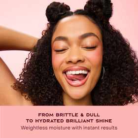 Shea Moisture Coconut & Hibiscus Smooth & Shine Oil texture on hand