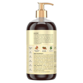 Shea Moisture shampoo bottle with creamy lather