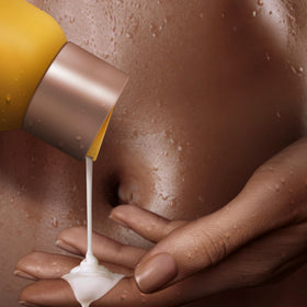SheaMoisture Raw Shea Butter Body Wash in a bathroom setting