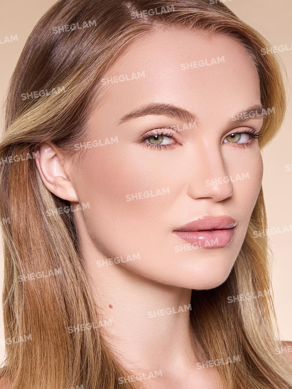 SHEGLAM Sun Sculpt Liquid Contour Stick 05 Golden Sun in use on model