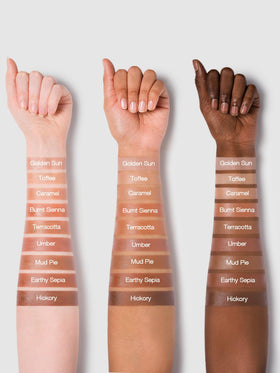 SHEGLAM Sun Sculpt Liquid Contour Stick 05 Golden Sun on makeup table