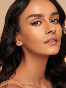 SHEGLAM Sun Sculpt Liquid Contour Stick Warm Honey in makeup setup