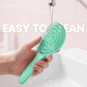 SHINLEA Hair Brush demonstrating detangling