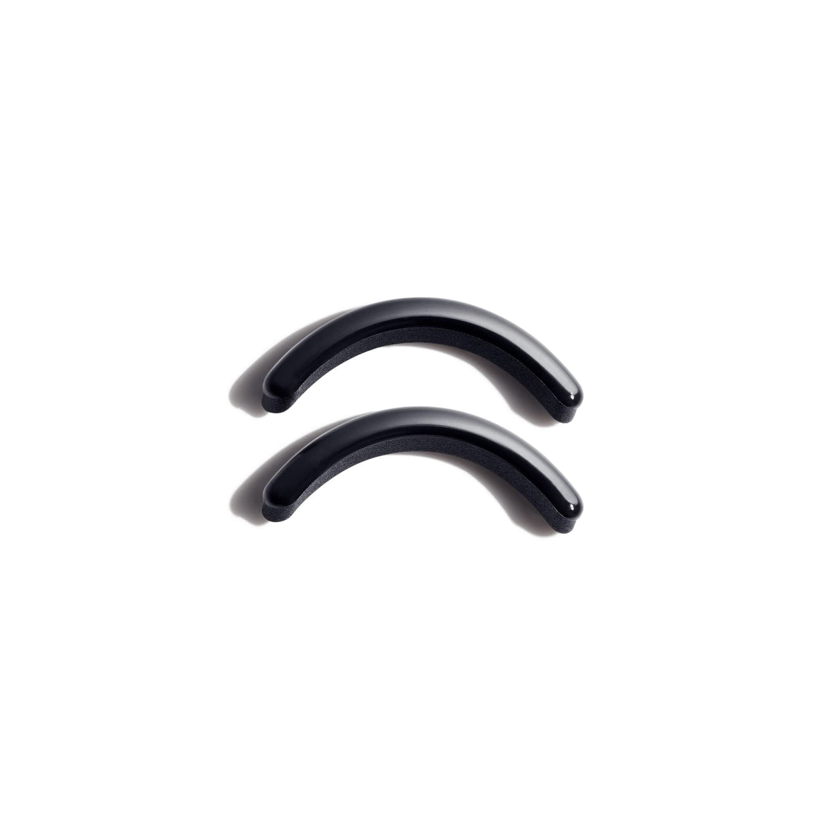 Shiseido Eyelash Curler Pad front view with two refill pads