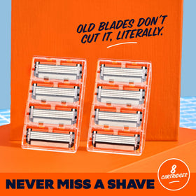 Side view of Dollar Shave Club 4 Blade Razor with lubricant strip
