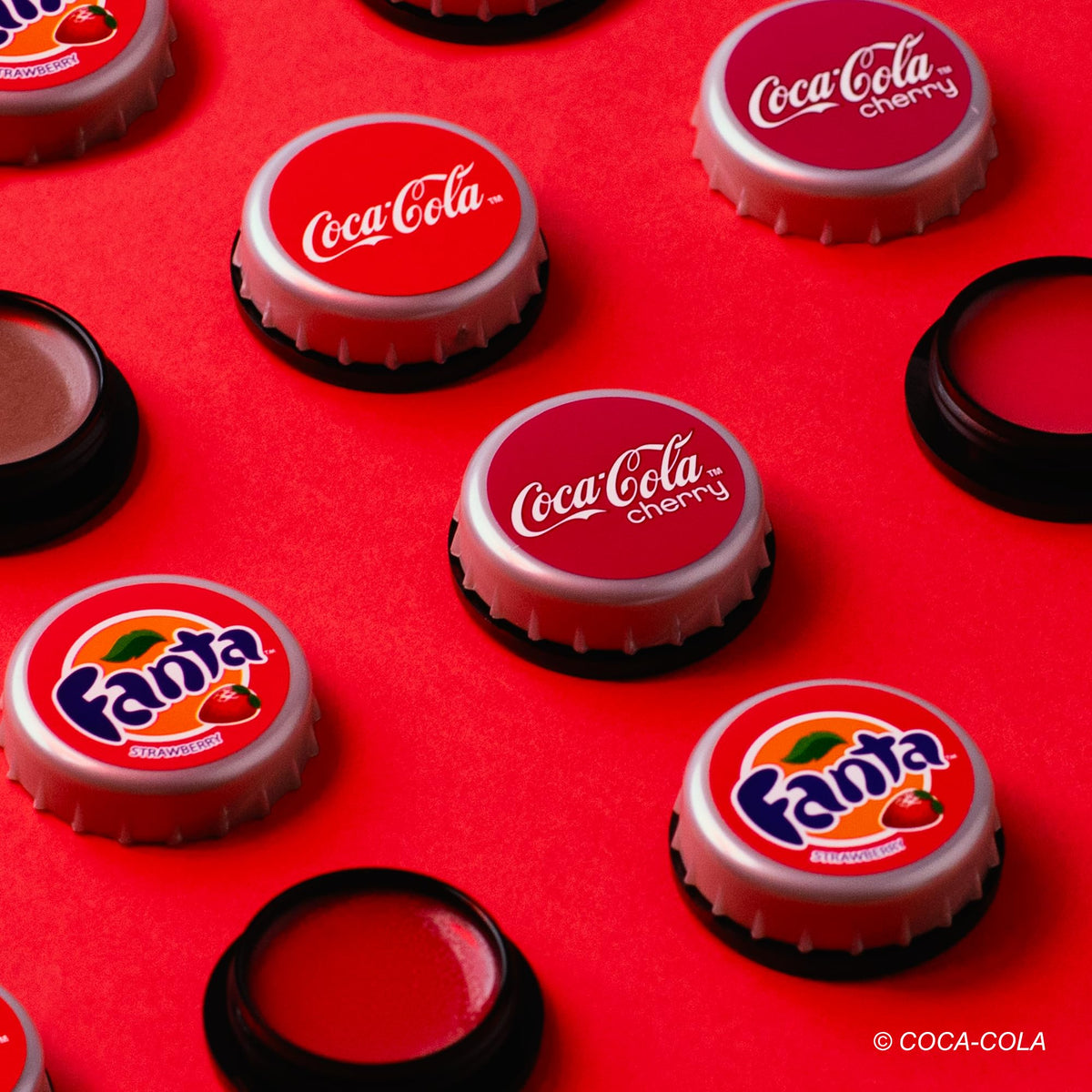 Side view of Lip Smacker Coca Cola lip balms