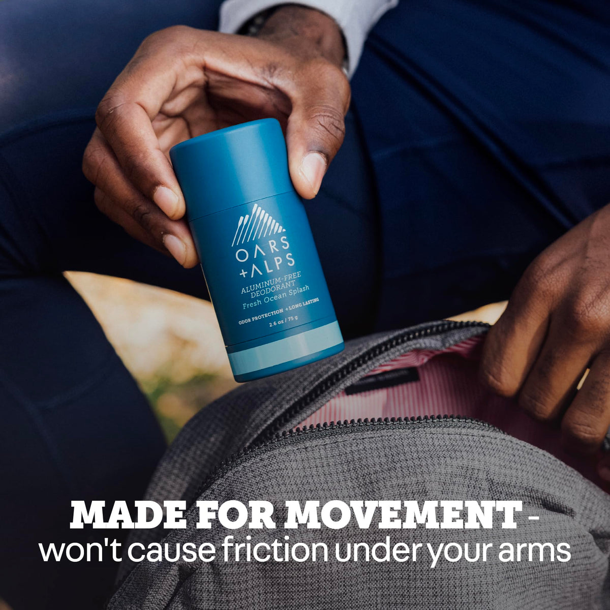 Side view of Oars + Alps Men's Deodorant with clear formula