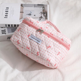 Side view of uekeboag Large Quilted Makeup Bag in checker pink
