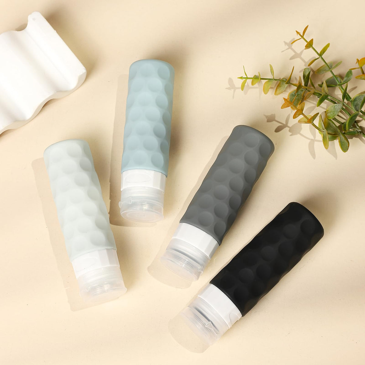 Silevoler travel bottles in hand showing portability