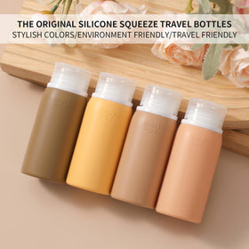 Silicone bottles and jars from Muslish travel kit displayed