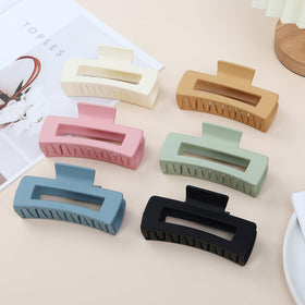 Sisiaipu 4 Inch Large Hair Claw Clips displayed in a stylish arrangement