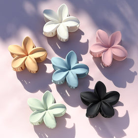 Sisiaipu Flower Hair Claw Clip in green with a floral background