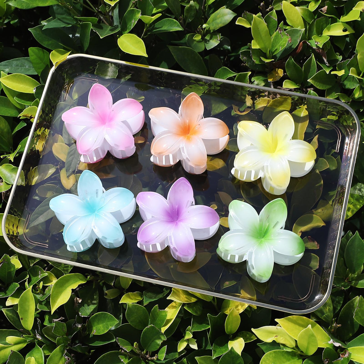Sisiaipu Flower Hair Clips Blue and Purple on a table