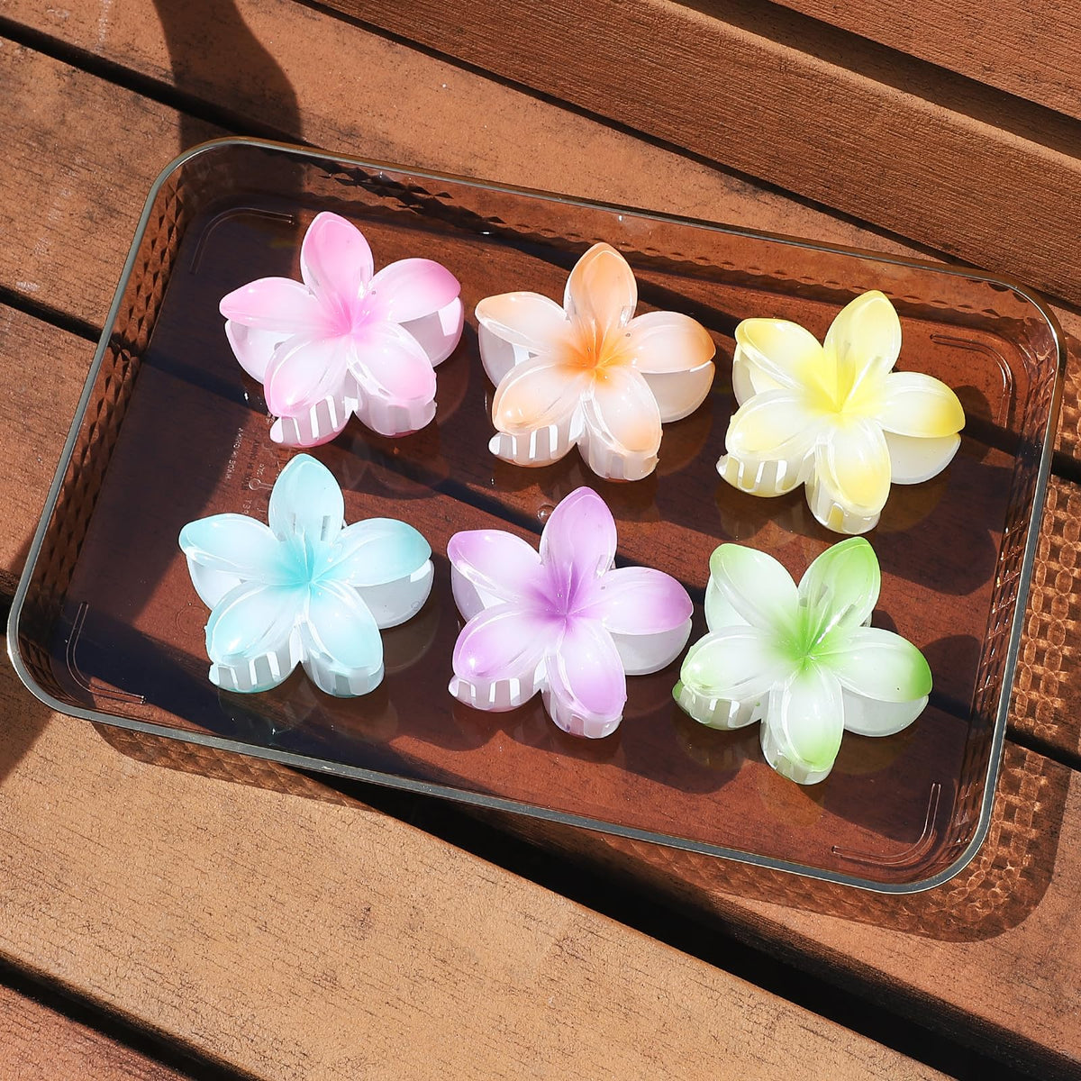 Sisiaipu Flower Hair Clips in a woman's hair during makeup