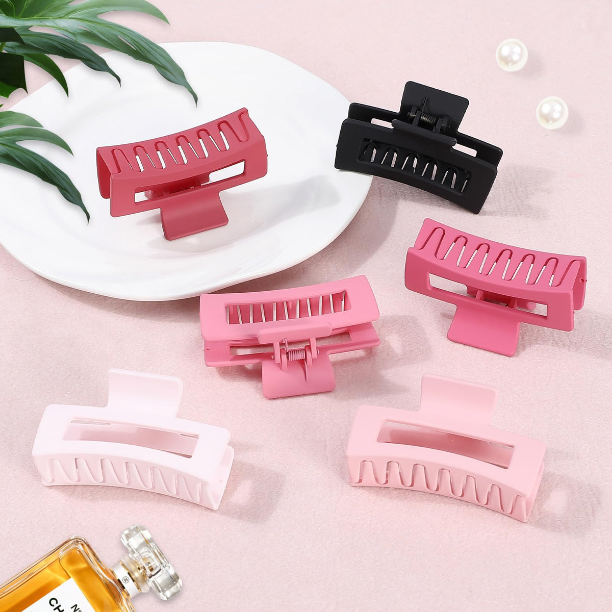 Sisiaipu hair claw clip in hot-pink holding hair back