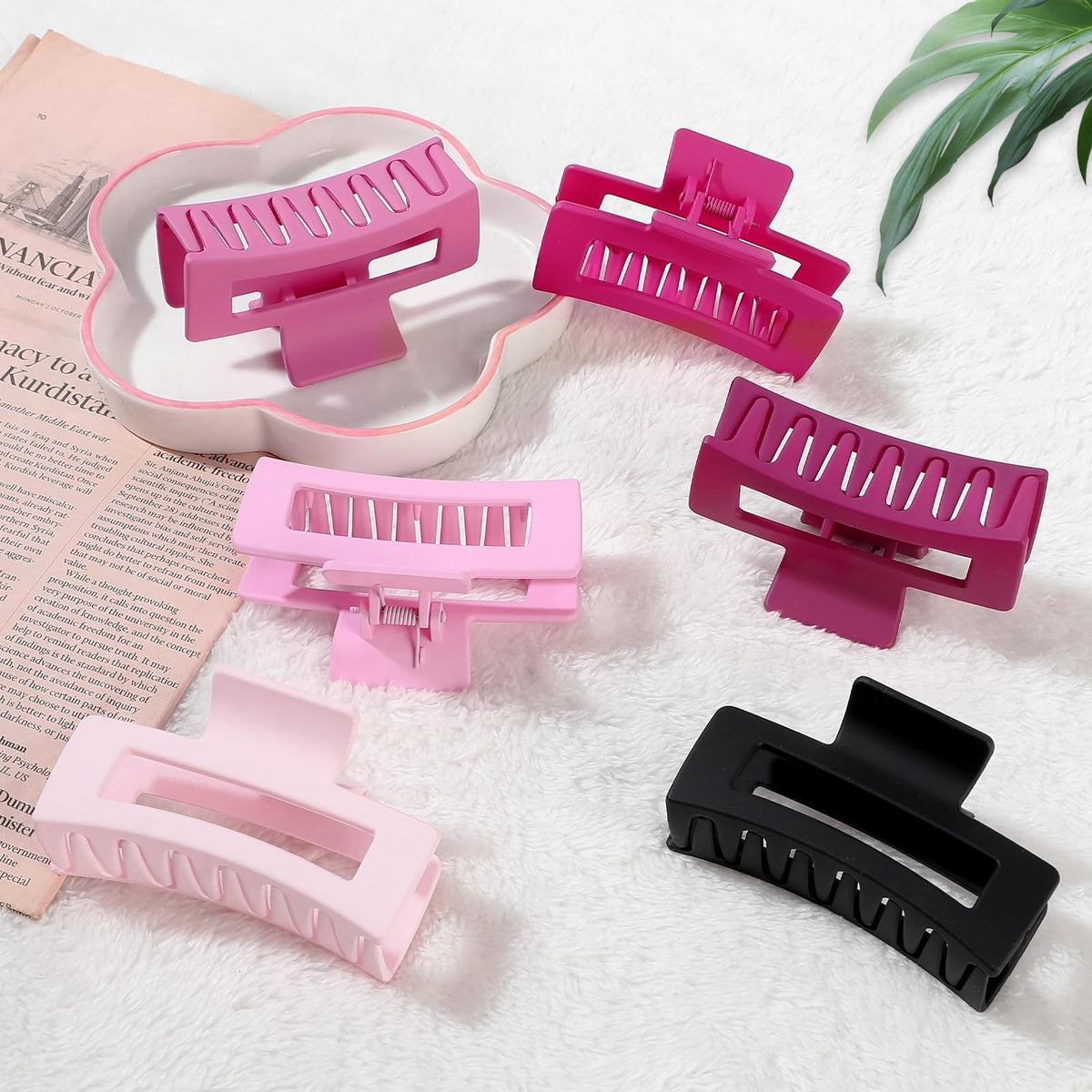 Sisiaipu hair claw clips displayed on a bathroom counter
