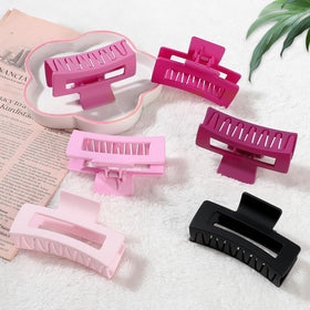Sisiaipu hair claw clips displayed on a bathroom counter