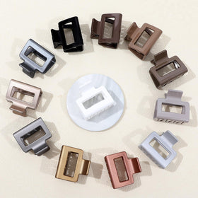 Sisiaipu Hair Claw Clips in a stylish arrangement on a table