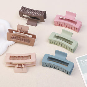 Sisiaipu Square Hair Clip in green colour displayed with other clips