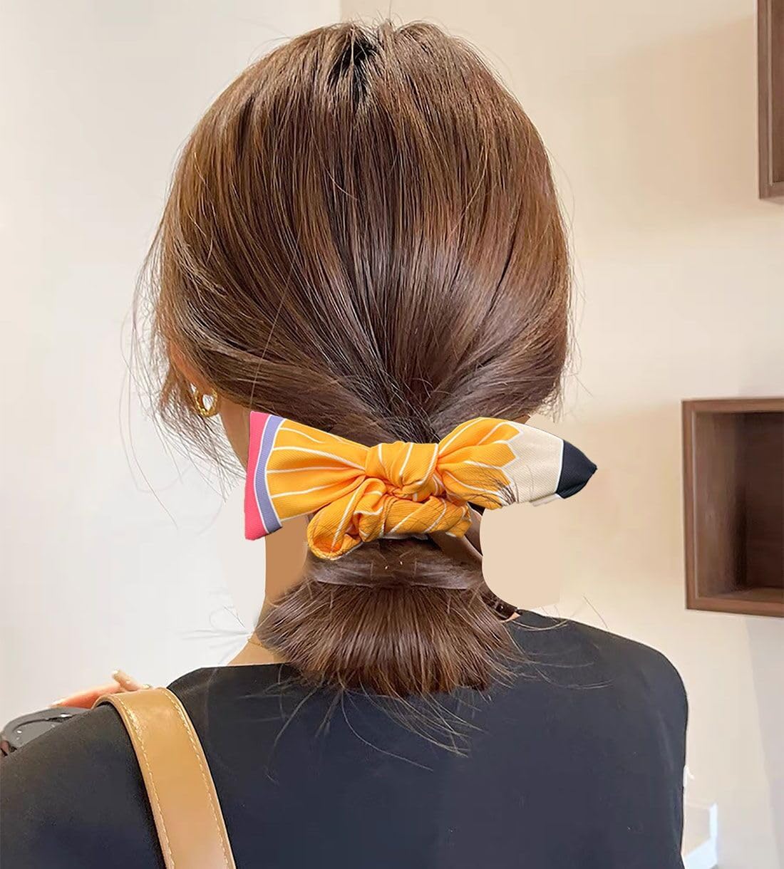 SKIRIFLA Pencil Bow Headband on a table with classroom items