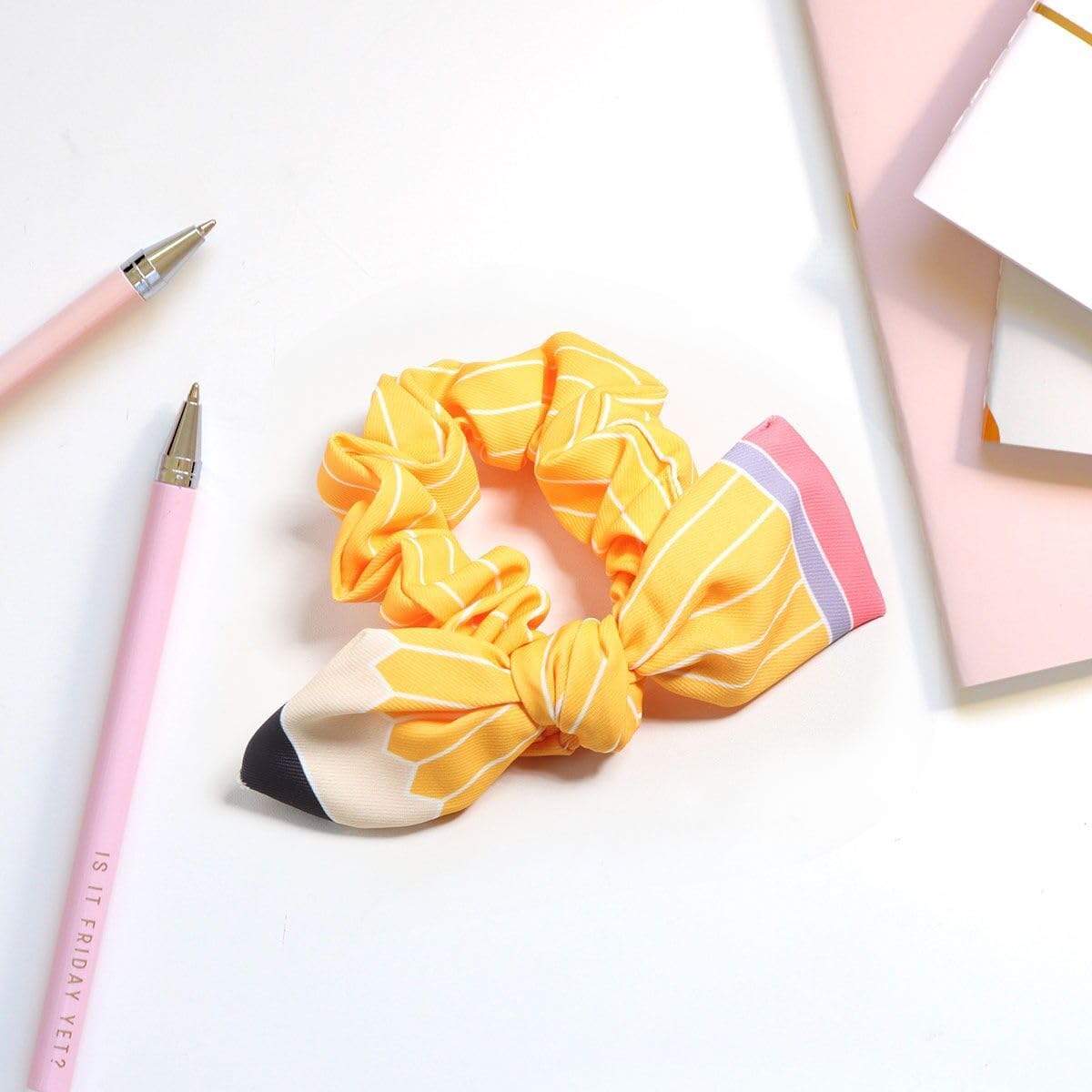 SKIRIFLA Teacher Hair Accessories Pencil Bow Headband worn by a teacher
