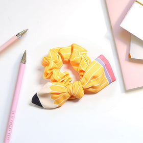 SKIRIFLA Teacher Hair Accessories Pencil Bow Headband worn by a teacher