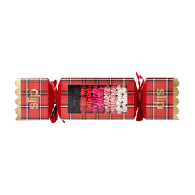 SLIP Silk Hair Ties set of 10 next to a hairbrush