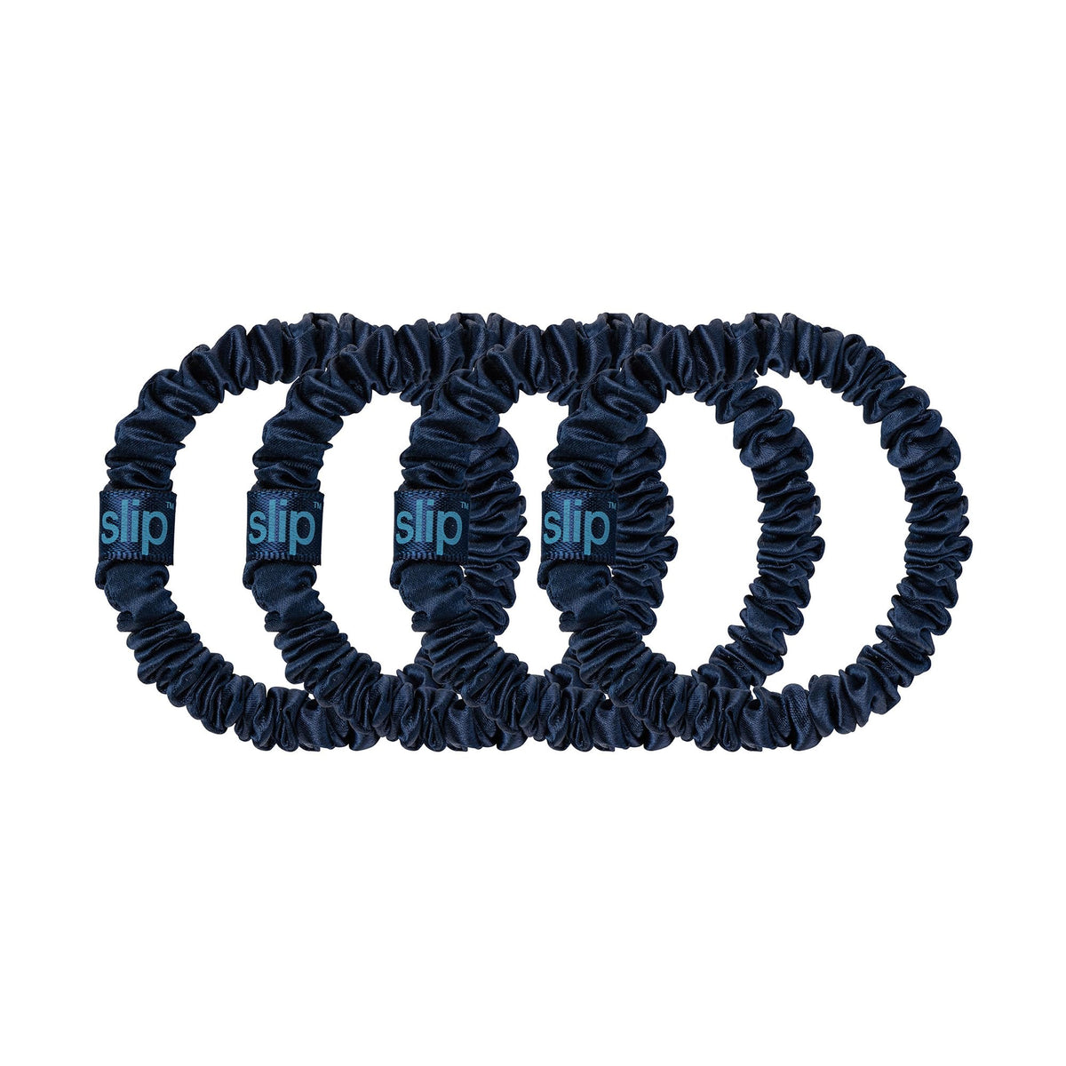 SLIP Silk Hair Ties Set of 4 Navy Skinny Scrunchies on a table