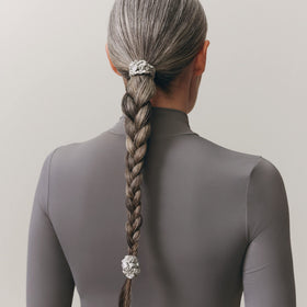 SLIP Silk Hair Ties Set of 4 silver skinny scrunchies in a stylish setting