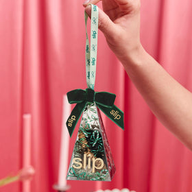 SLIP Silk scrunchies arranged on a stylish background