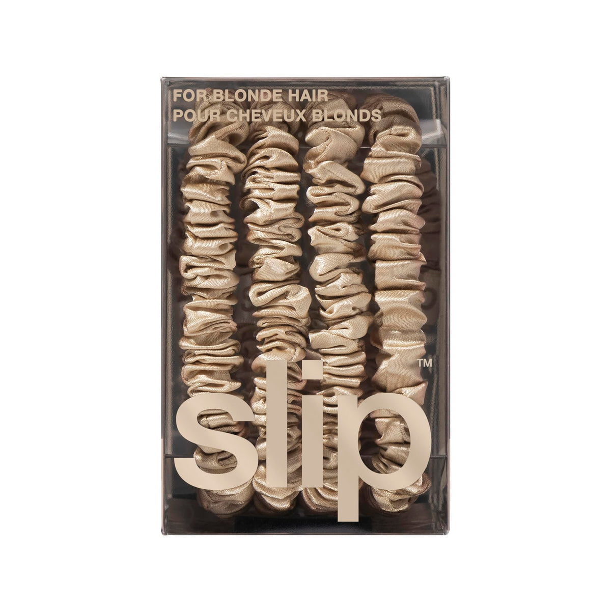 SLIP Silk Skinny Scrunchies alongside other hair care products