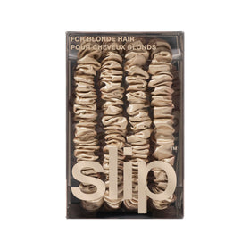 SLIP Silk Skinny Scrunchies alongside other hair care products