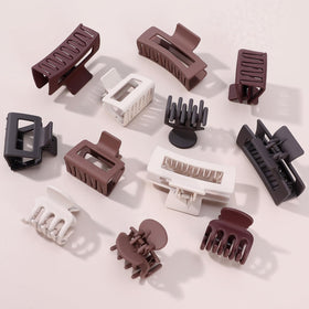 SMKSL hair claw clips displayed on a white background