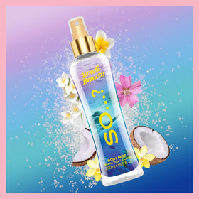 So...? Bondi Beauty Body Mist on a vanity with flowers