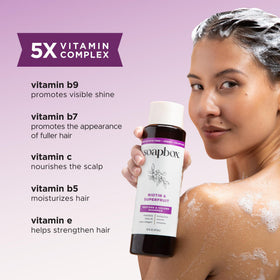 Soapbox Biotin & Super Fruit Shampoo and Conditioner on a bathroom shelf
