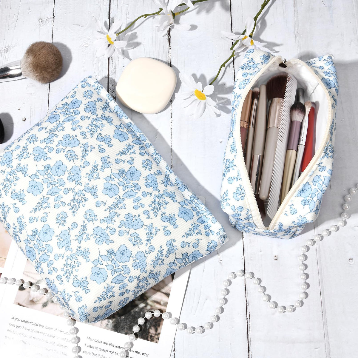 SOIDRAM blue floral makeup bag open with items