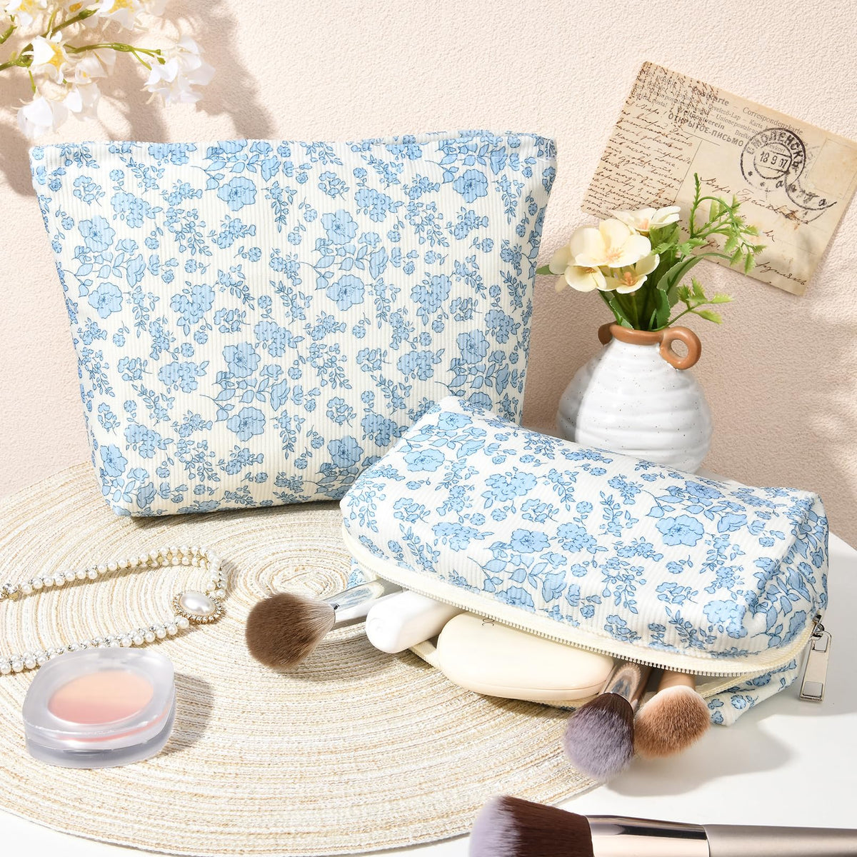 SOIDRAM blue floral makeup bag set on a table