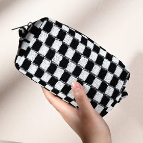 SOIDRAM checkered cosmetic bag lifestyle scene on a vanity