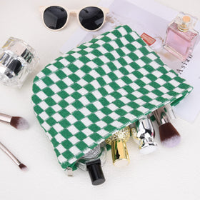 SOIDRAM checkered cosmetic bag set stacked together