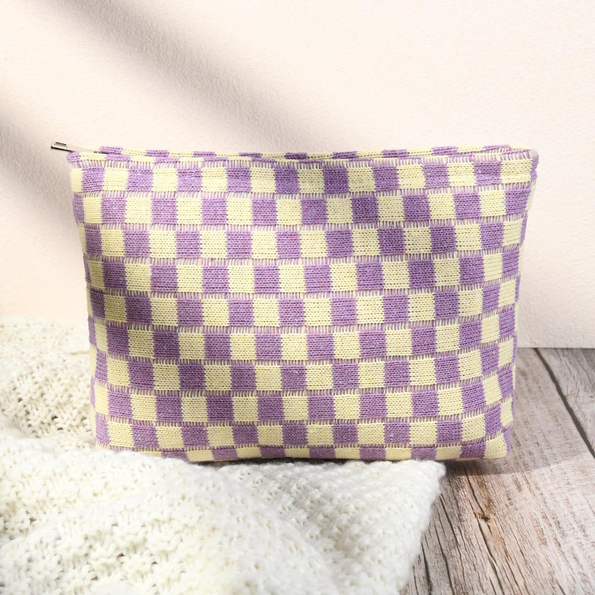 SOIDRAM checkered makeup bags stacked together