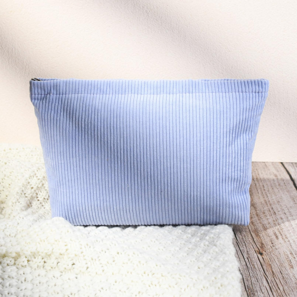 SOIDRAM Corduroy Makeup Bag in a travel setting
